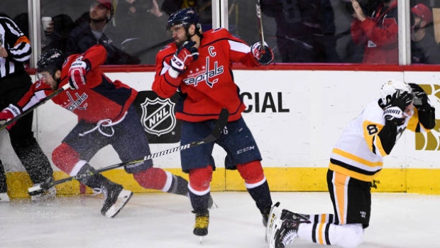 Wilson, Ovechkin and Dumoulin, Getty Images Wilson, Ovechkin and Dumoulin