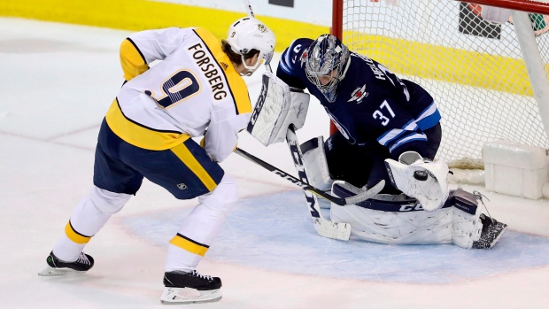 Connor Hellebuyck Filip Forsberg, The Canadian Press Connor Hellebuyck Filip Forsberg