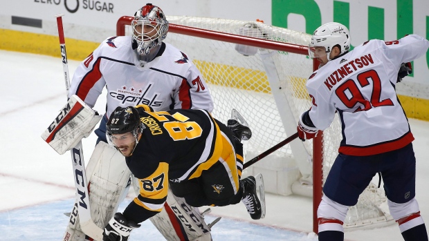 Sidney Crosby and Evgeny Kuznetsov, The Canadian Press Sidney Crosby and Evgeny Kuznetsov