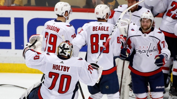 Holtby celebrates, The Canadian Press Holtby celebrates