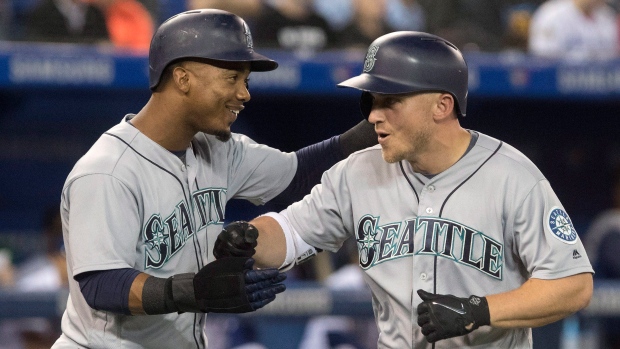 Jean Segura and Kyle Seager celebrate, The Canadian Press Jean Segura and Kyle Seager celebrate