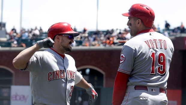 Adam Duvall and Joey Votto celebrate, The Canadian Press Adam Duvall and Joey Votto celebrate