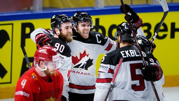 Canada Celebrates Game-Winning Goal, LISELOTTE SABROE/AFP/Getty Images Canada Celebrates Game-Winning Goal