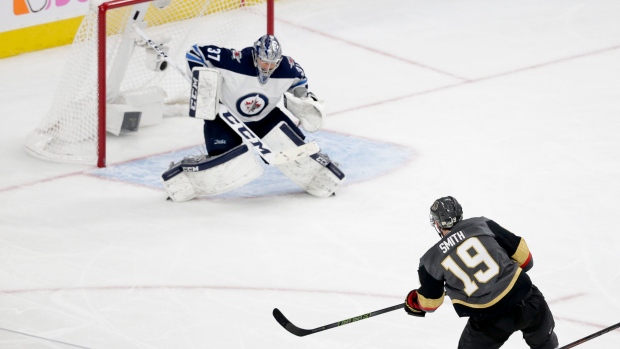 Reilly Smith, Connor Hellebuyck , The Canadian Press Reilly Smith, Connor Hellebuyck