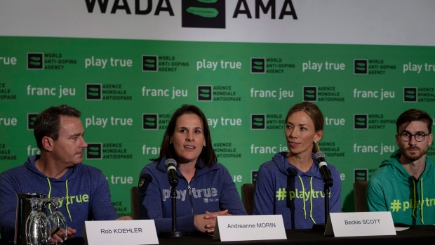 Four members of the World Anti-Doping Agency athlete committee speak at news conference
