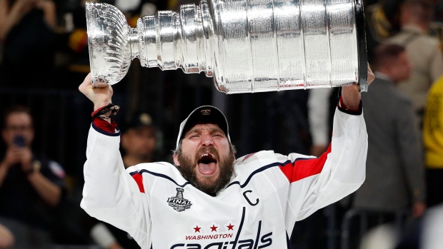 Alexander Ovechkin hoists Stanley Cup, The Canadian Press Alexander Ovechkin hoists Stanley Cup
