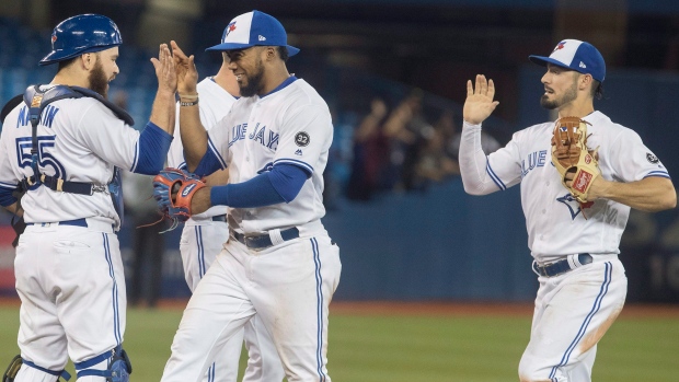Russell Martin, Teoscar Hernandez and Randal Grichuk , The Canadian Press Russell Martin, Teoscar Hernandez and Randal Grichuk