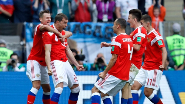 Russia celebrates, The Canadian Press Russia celebrates