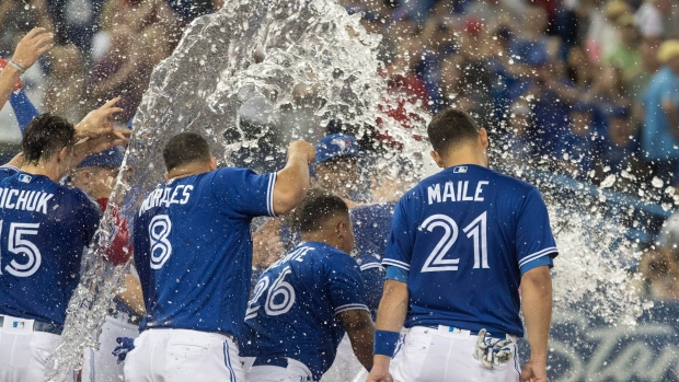 Toronto Blue Jays celebrate, The Canadian Press Toronto Blue Jays celebrate