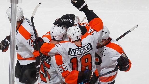Flyers celebrate, Gregory Shamus/NHLI via Getty Images Flyers celebrate