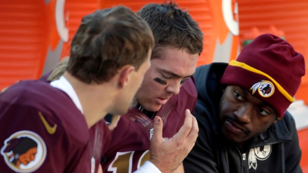 Robert Griffin III and Colt McCoy, The Canadian Press Robert Griffin III and Colt McCoy