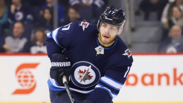 Jets sign forward Adam Lowry to three-year contract worth $8.75 million