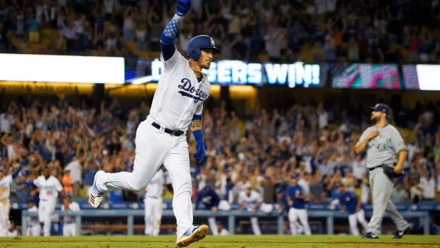 Yasmani Grandal, The Canadian Press Yasmani Grandal