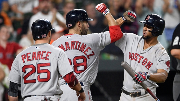 J.D. Martinez Xander Bogaerts Steve Pearce, The Canadian Press J.D. Martinez Xander Bogaerts Steve Pearce
