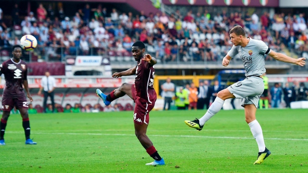 Edin Dzeko, The Canadian Press Edin Dzeko