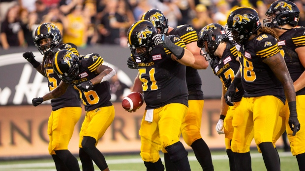 Brandon Banks, Tiger-Cats celebrate, The Canadian Press Brandon Banks, Tiger-Cats celebrate