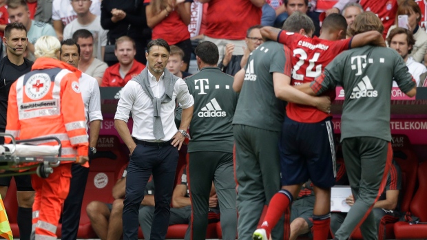 Corentin Tolisso helped off pitch