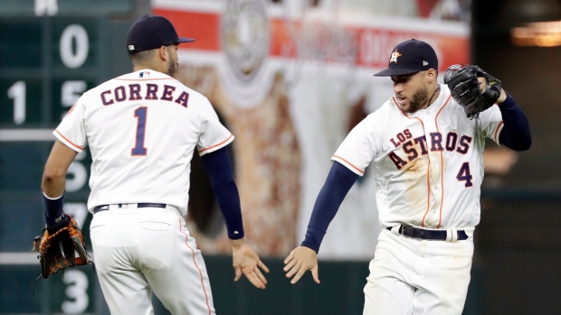 Carlos Correa George Springer, The Canadian Press Carlos Correa George Springer