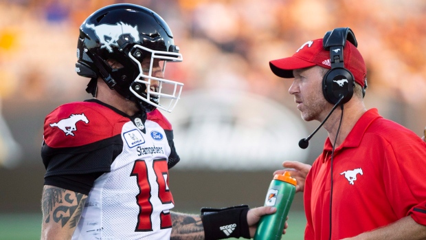 Dave Dickenson Bo Levi Mitchell, The Canadian Press Dave Dickenson Bo Levi Mitchell