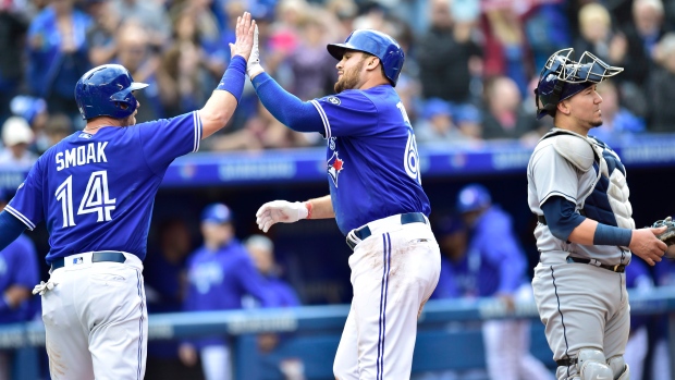 Rowdy Tellez and Justin Smoak, The Canadian Press Rowdy Tellez and Justin Smoak