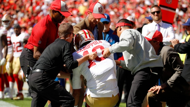 Jimmy Garoppolo helped off the field, The Canadian Press Jimmy Garoppolo helped off the field