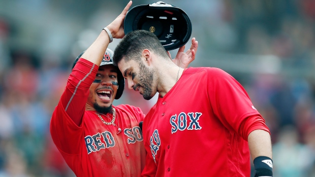 Mookie Betts J.D. Martinez, The Canadian Press Mookie Betts J.D. Martinez
