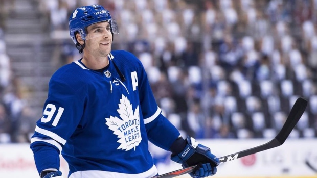 Toronto Maple Leafs center John Tavares (91) reacts after picking