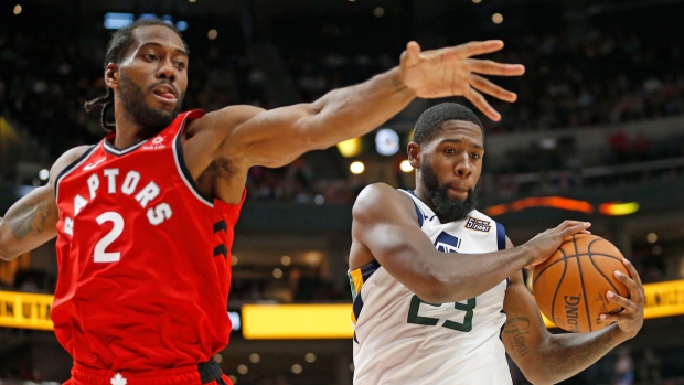 Kawhi Leonard and Royce O'Neale 