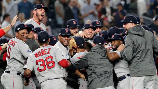 Boston Red Sox celebrate , The Canadian Press Boston Red Sox celebrate