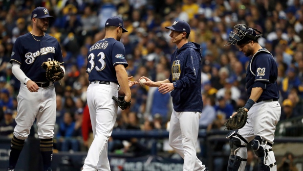 Xavier Cedeno Craig Counsell, The Canadian Press Xavier Cedeno Craig Counsell