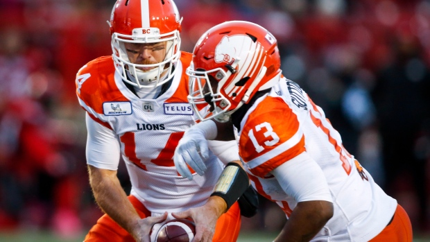 Travis Lulay and Tyrell Sutton