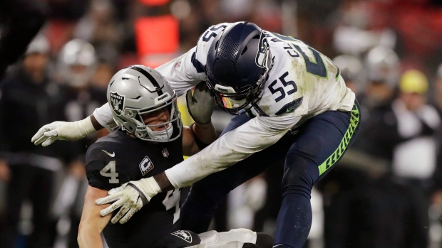 Derek Carr Frank Clark, The Canadian Press Derek Carr Frank Clark