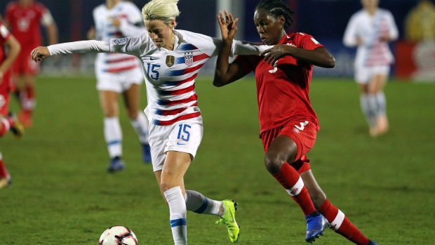 Megan Rapinoe and Kadeisha Buchanan