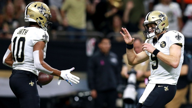 Tre'Quan Smith and Drew Brees