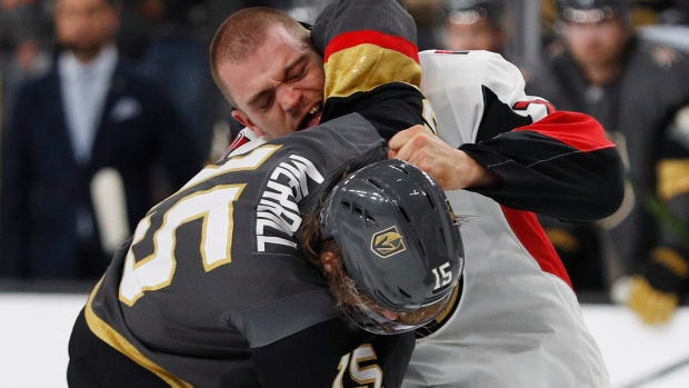 Borowiecki fights Merrill, The Canadian Press Borowiecki fights Merrill