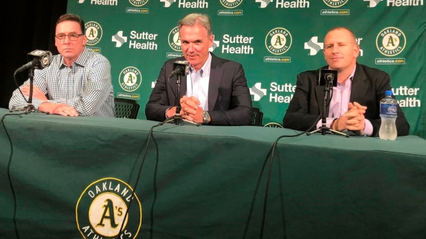Billy Beane, David Forst, Bob Melvin, The Canadian Press Billy Beane, David Forst, Bob Melvin