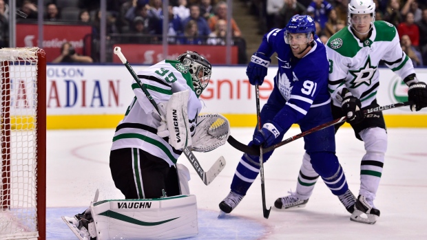 Anton Khudobin, John Tavares, John Klingberg , The Canadian Press Anton Khudobin, John Tavares, John Klingberg