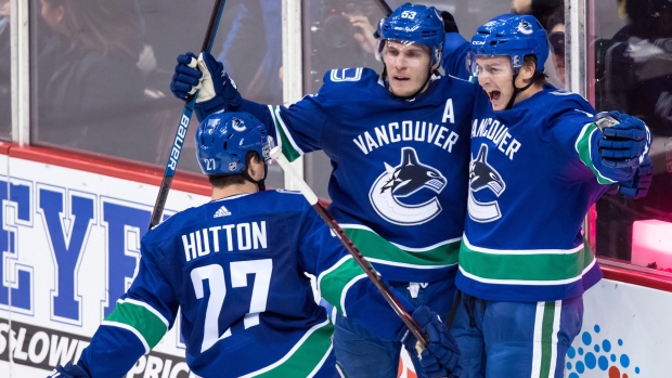 Vancouver Canucks celebrate goal, The Canadian Press Vancouver Canucks celebrate goal