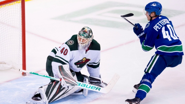 Elias Pettersson and Devan Dubnyk