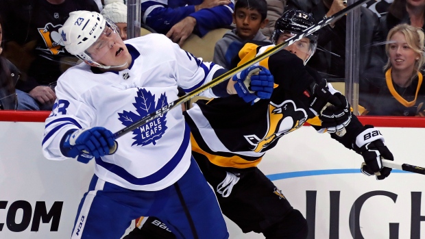 Travis Dermott and Bryan Rust, The Canadian Press Travis Dermott and Bryan Rust