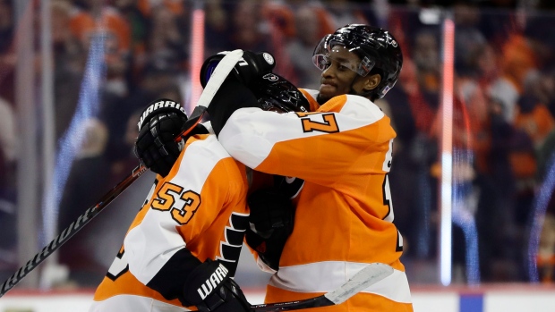 Shayne Gostisbehere and Wayne Simmonds, The Canadian Press Shayne Gostisbehere and Wayne Simmonds