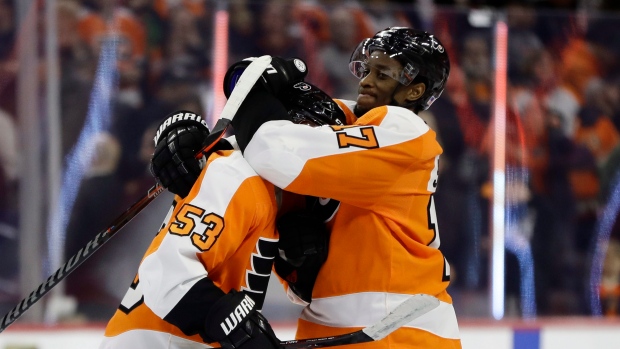 Shayne Gostisbehere and Wayne Simmonds