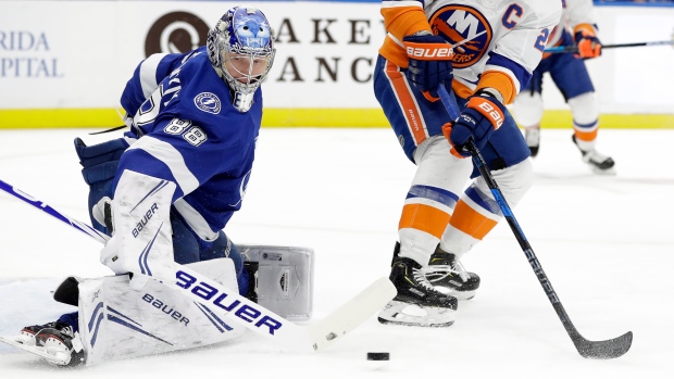 Andrei Vasilevskiy and Anders Lee, The Canadian Press Andrei Vasilevskiy and Anders Lee