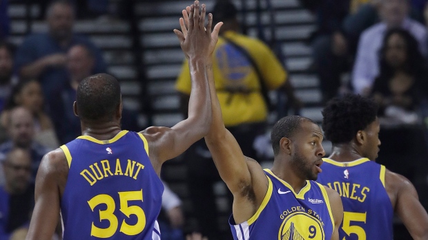 Kevin Durant and Andre Iguodala, The Canadian Press Kevin Durant and Andre Iguodala