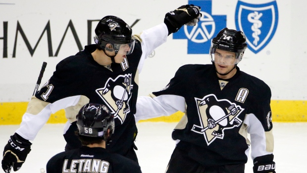 Kunitz, Malkin celebrate , The Canadian Press Kunitz, Malkin celebrate