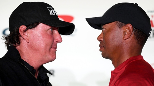Phil Mickelson and Tiger Woods face off