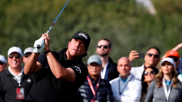 Mickelson wins match against Woods with birdie on 22nd hole Article Image 0