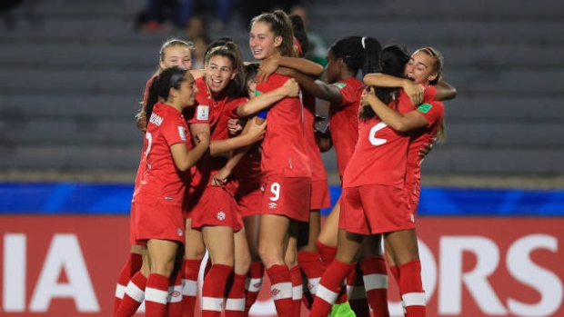 Jordyn Huitema and Canada celebrate