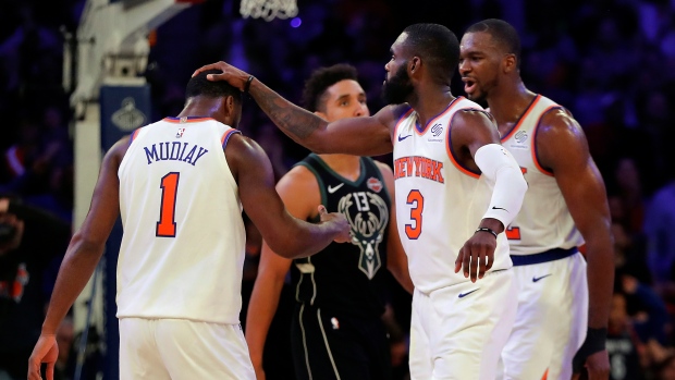 Emmanuel Mudiay Tim Hardaway Jr. , The Canadian Press Emmanuel Mudiay Tim Hardaway Jr.