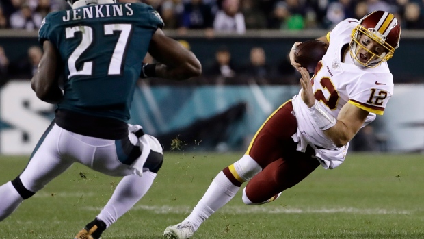 Colt McCoy, The Canadian Press Colt McCoy